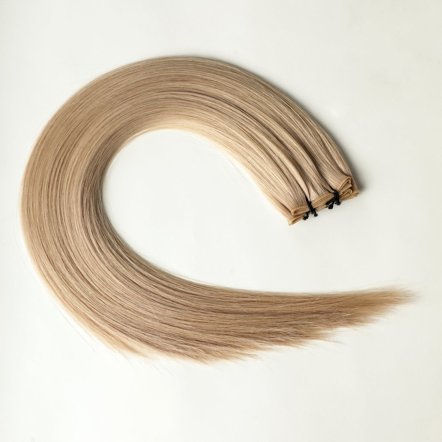 Diora - 100 gram premium Genius Weft extensions