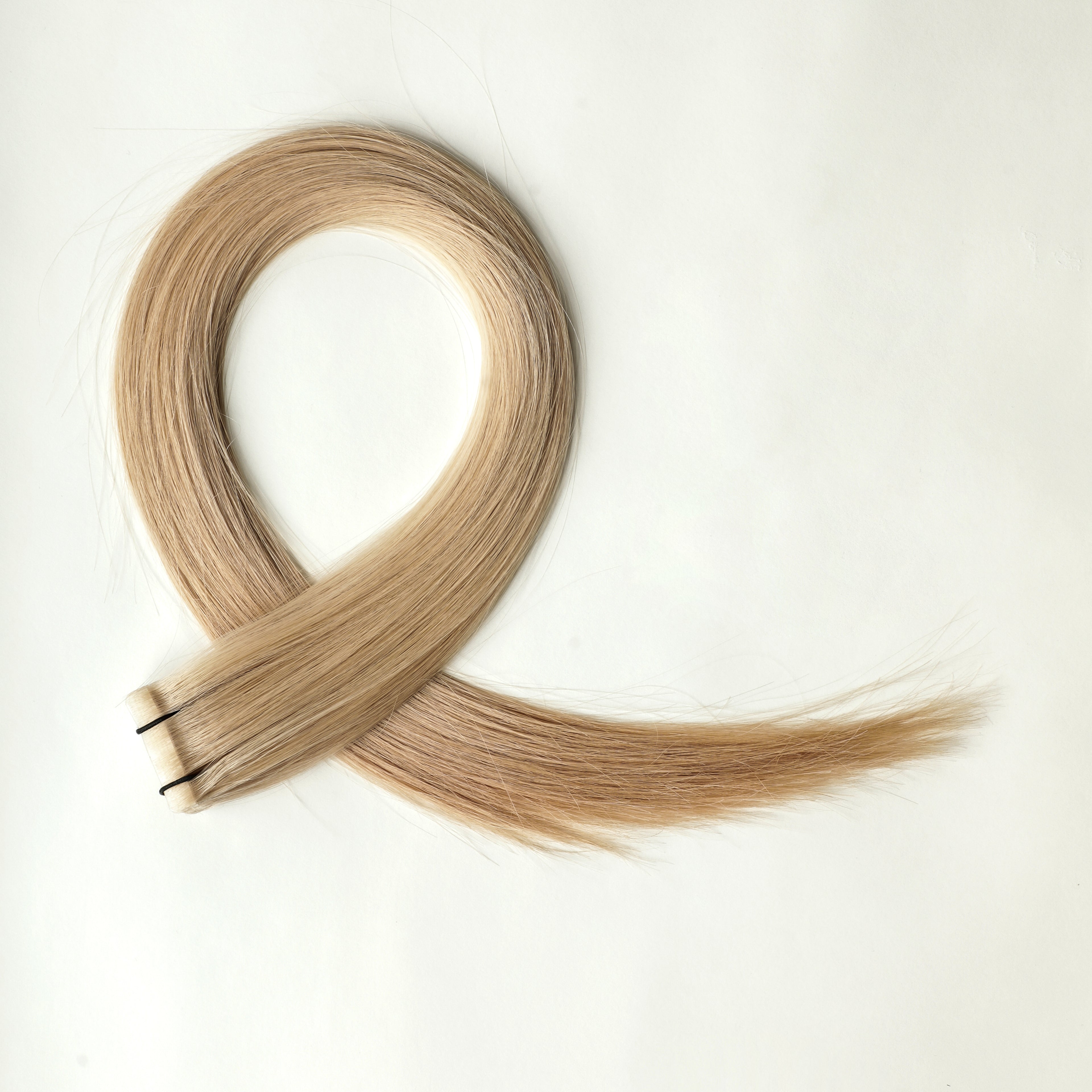 Diora - 50 gram premium invisible tape extensions