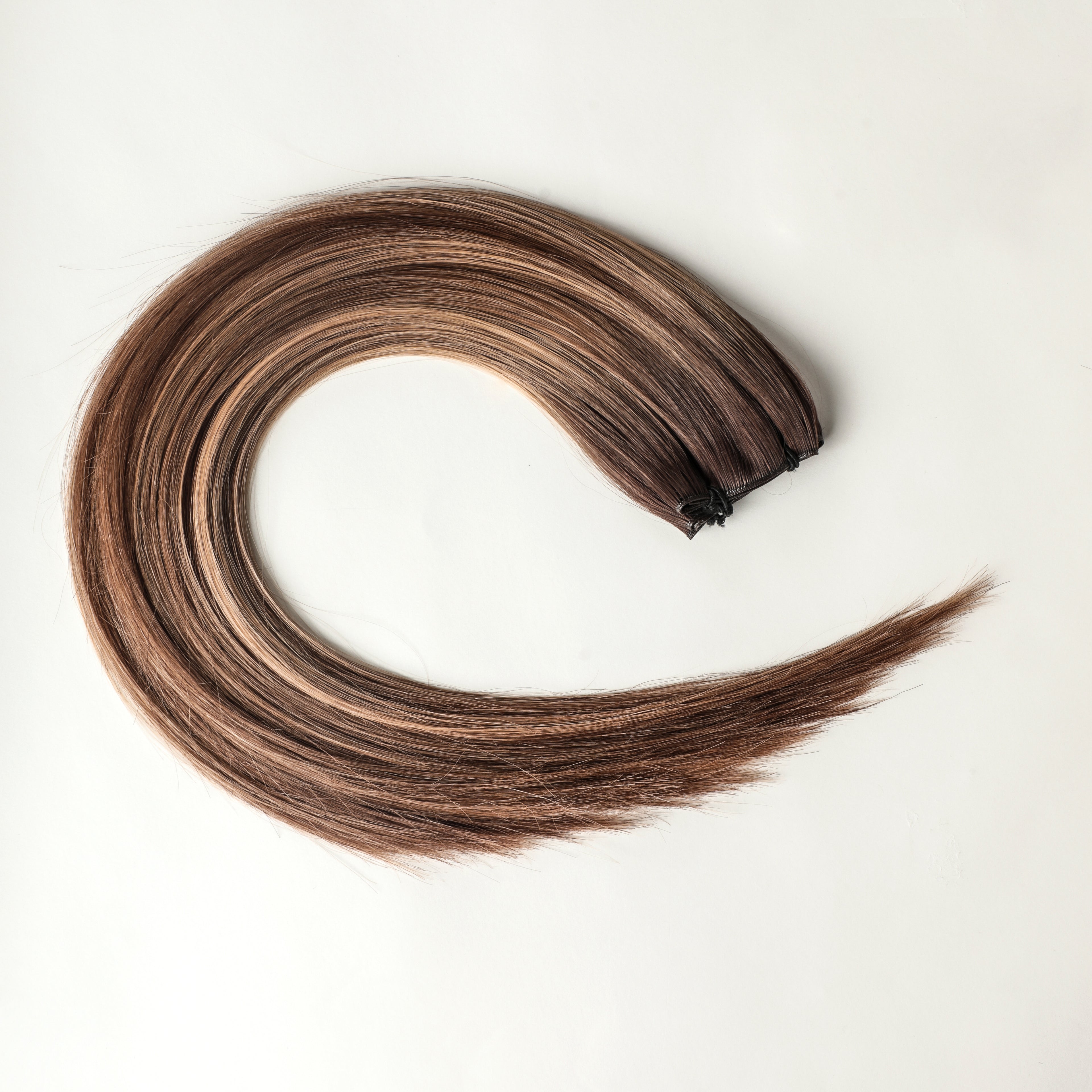 Cassia - 100 gram premium Genius Weft extensions