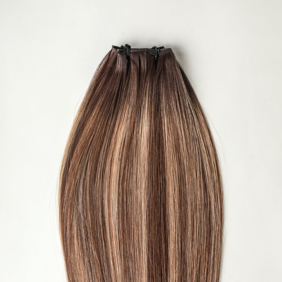 Cassia - 100 gram premium Genius Weft extensions