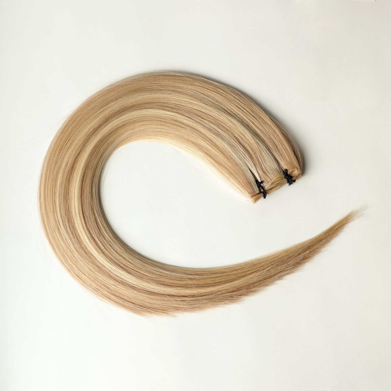 Liora - 100 gram premium Genius Weft extensions
