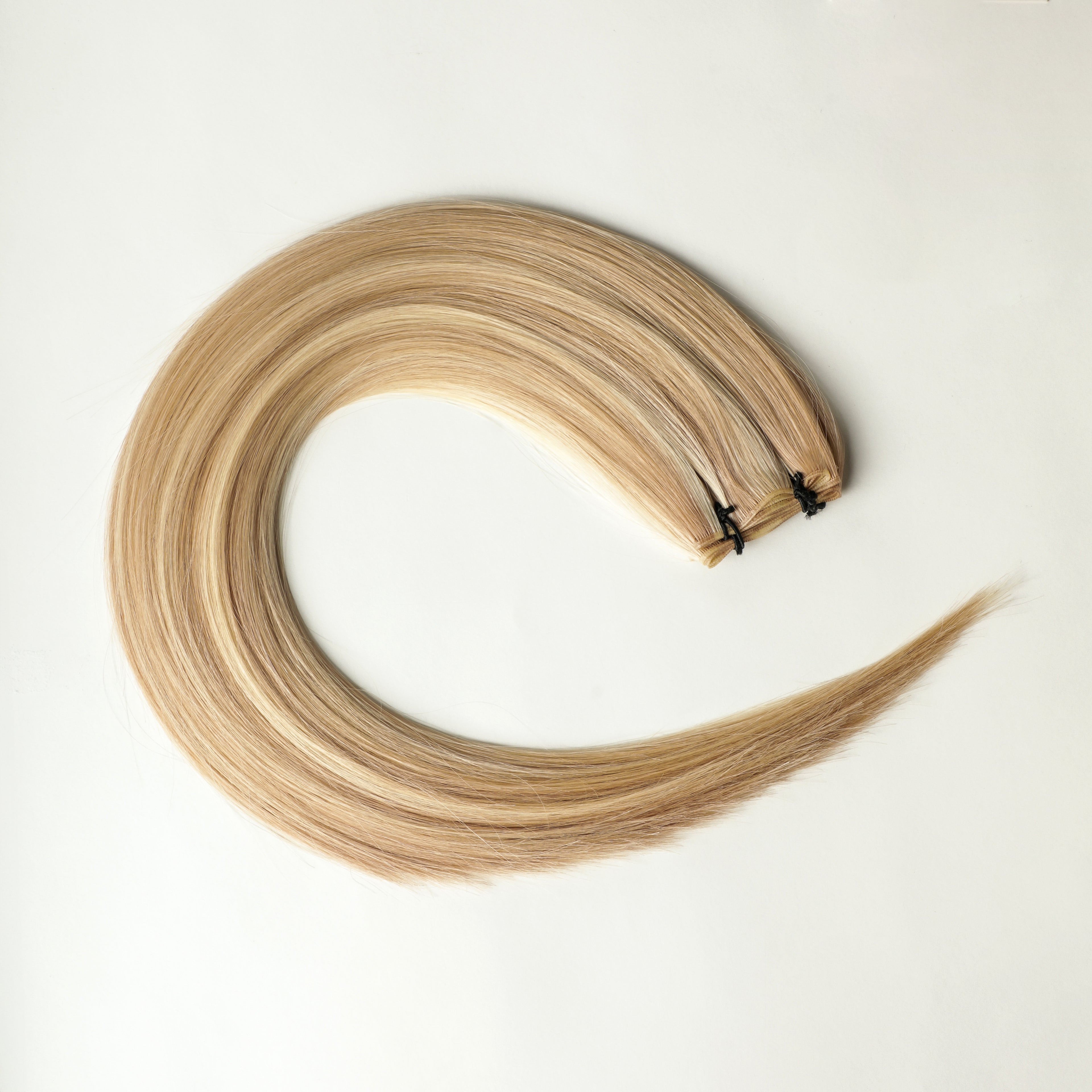 Liora - 100 gram premium Genius Weft extensions