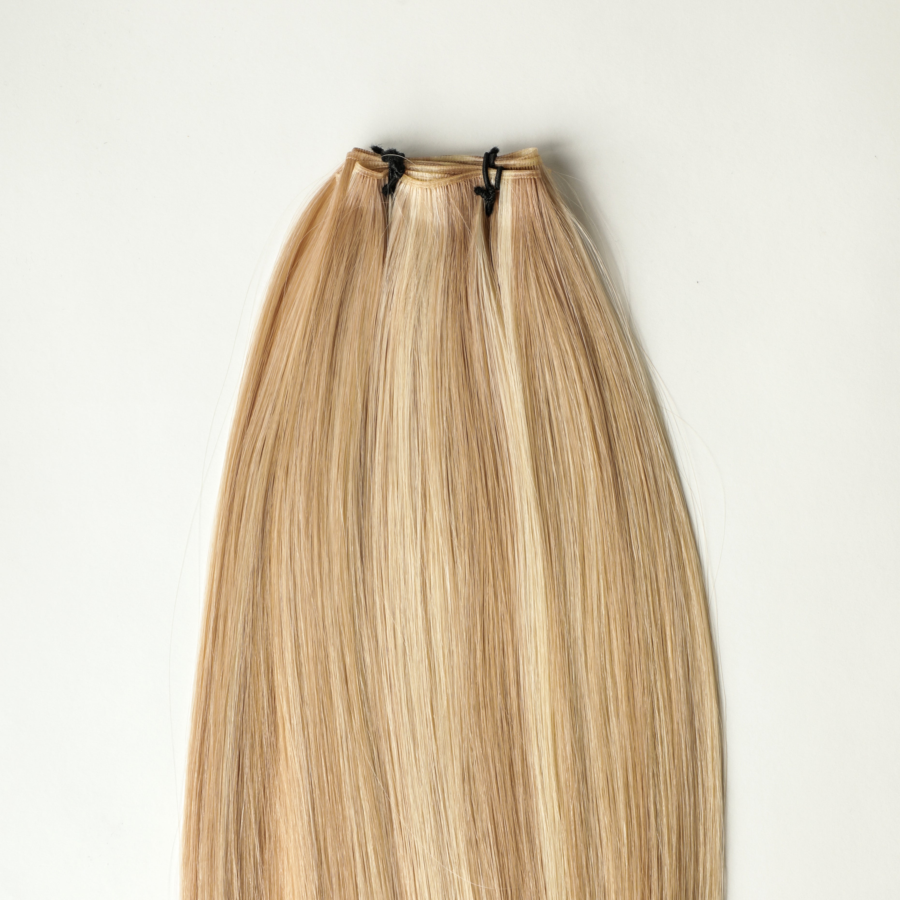 Liora - 100 gram premium Genius Weft extensions
