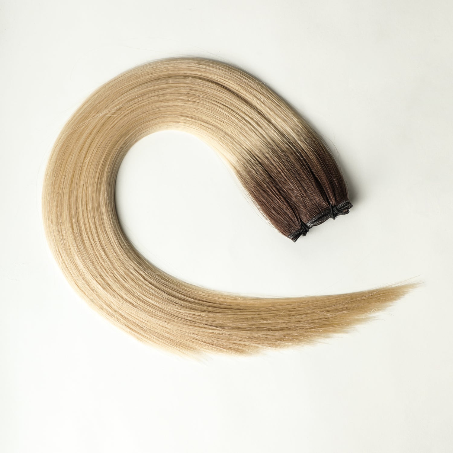 Lorelle - 100 gram premium Genius Weft extensions