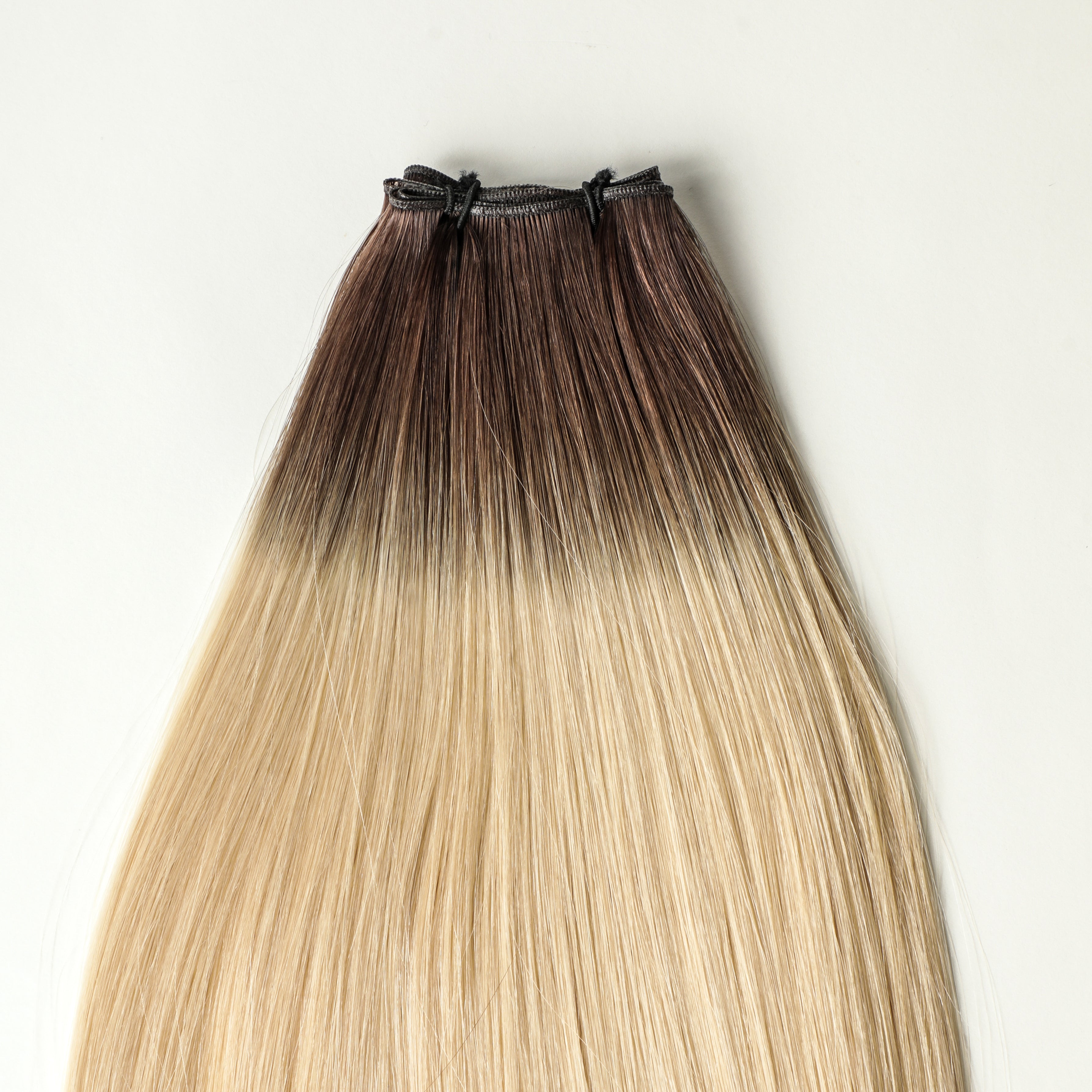 Lorelle - 100 gram premium Genius Weft extensions